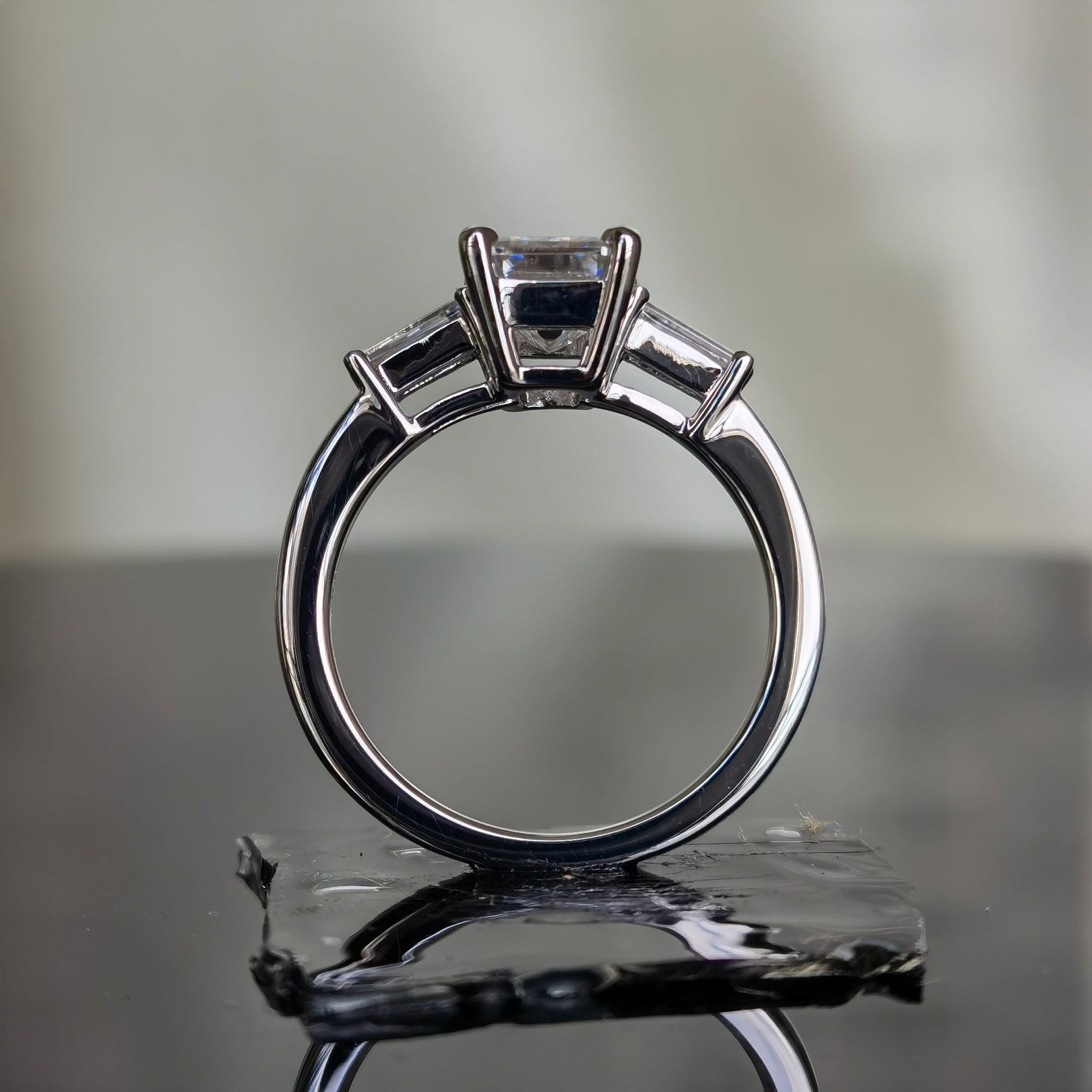 DovEggs 2 carat emerald three stone sterling silver moissanite ring