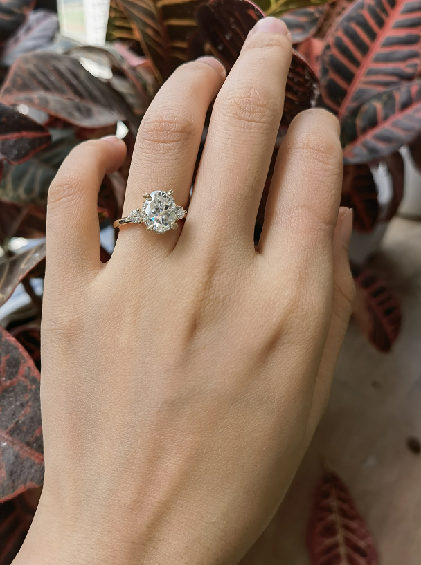 The Katherine oval side stone moissanite engagement ring