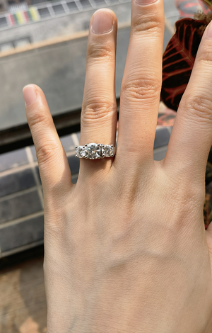 Doveggs round three stone moissanite engagement ring