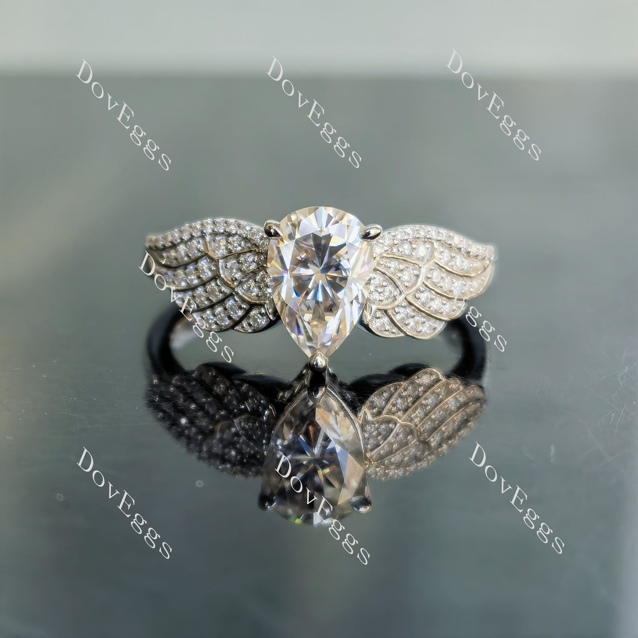 DovEggs pear wing moissanite engagement ring