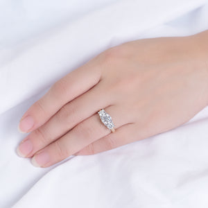 doveggs round three-stone moissanite engagement ring