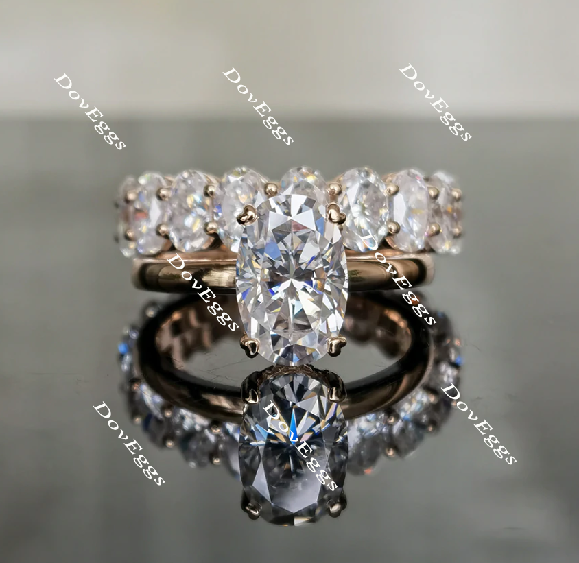 elongated oval moissanite heart prong engagement ring