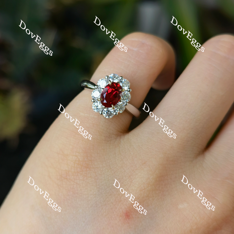 Oval shape halo vivid pigeon blood ruby colored gem ring on hand view| Doveggs