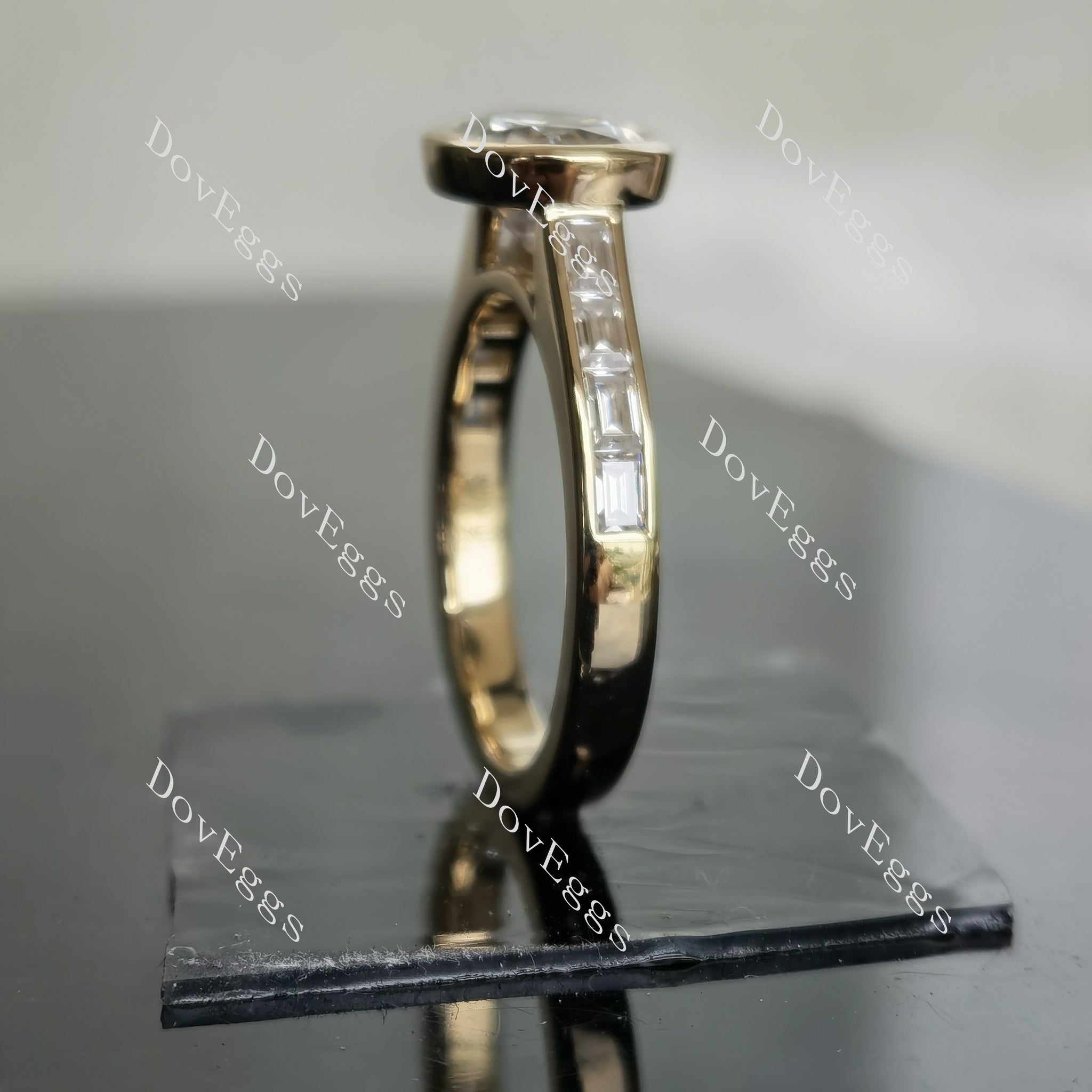 Oval bezel channel set moissanite engagement ring side view| Doveggs