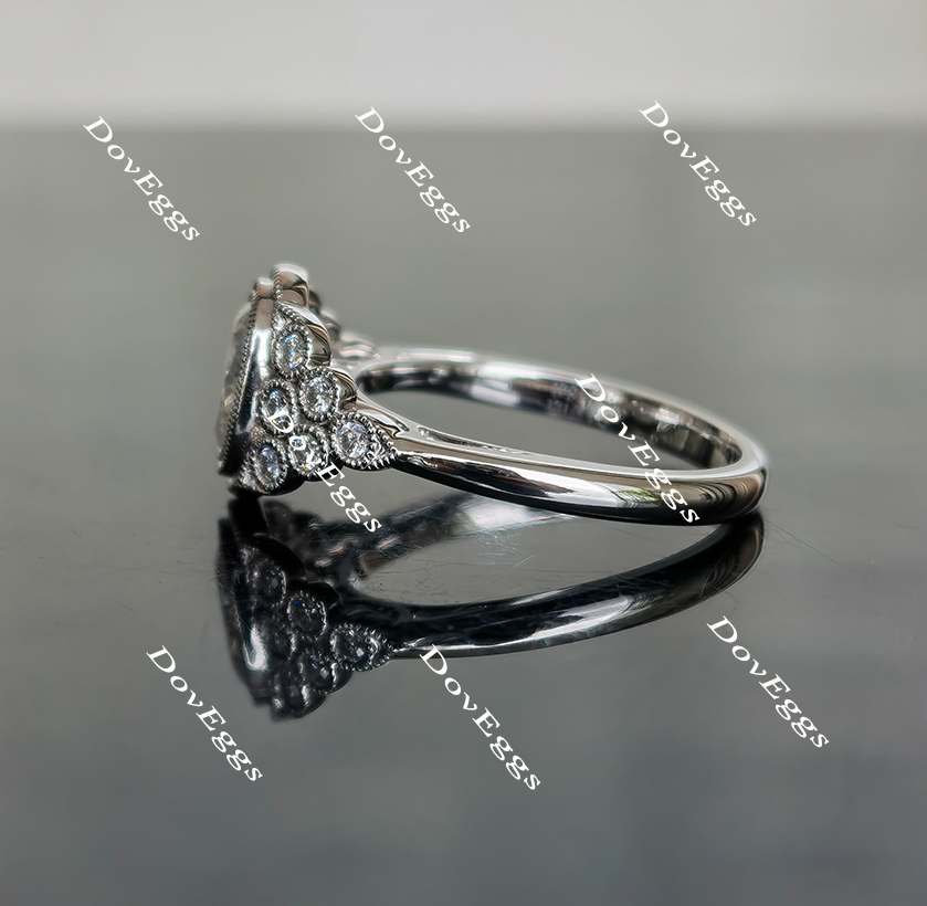 Atherine’s Joy oval side-stone moissanite ring