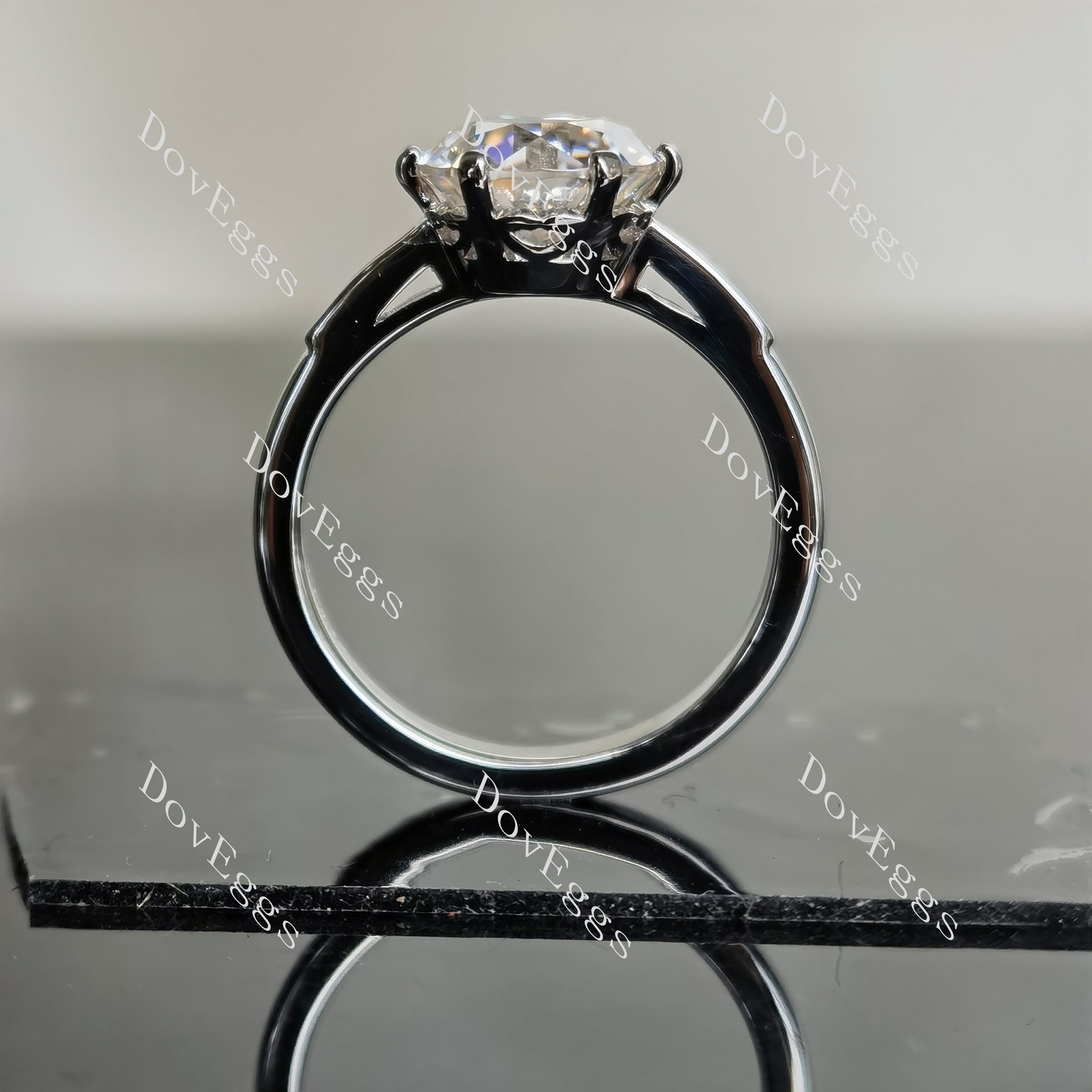 DovEggs round channel set moissanite engagement ring