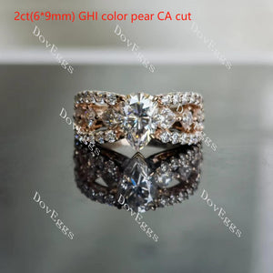 The Mikinzy pear split shank half eternity pave moissanite engagement ring