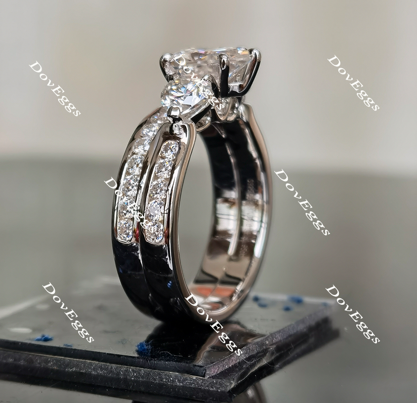 The Kiera Alaina pear half eternity channel set three stones moissanite engagement ring