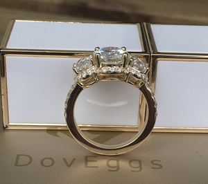 Doveggs oval three-stone halo moissanite engagement ring