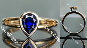 Doveggs pear bezel setting split shank intense royal blue sapphire colored gem ring