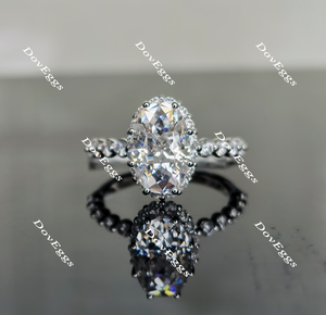 elongated oval moissanite engagement ring