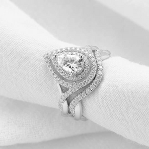 DovEggs  1.25 carat pear bridal set sterling silver moissanite ring