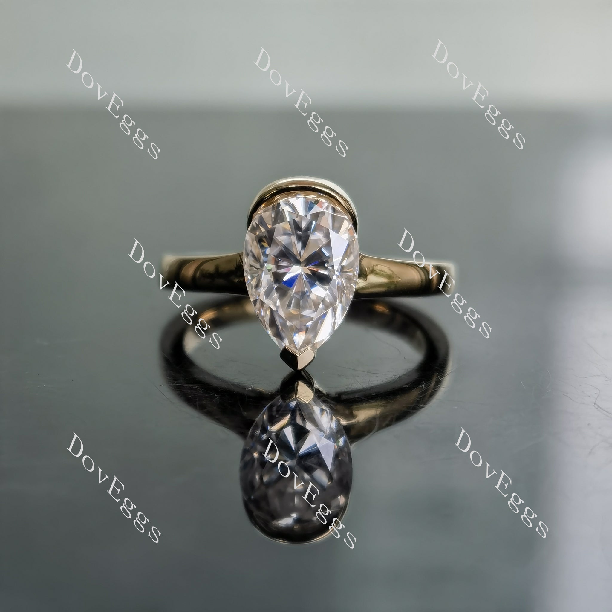 Kindal pear solitaire moissanite engagement ring